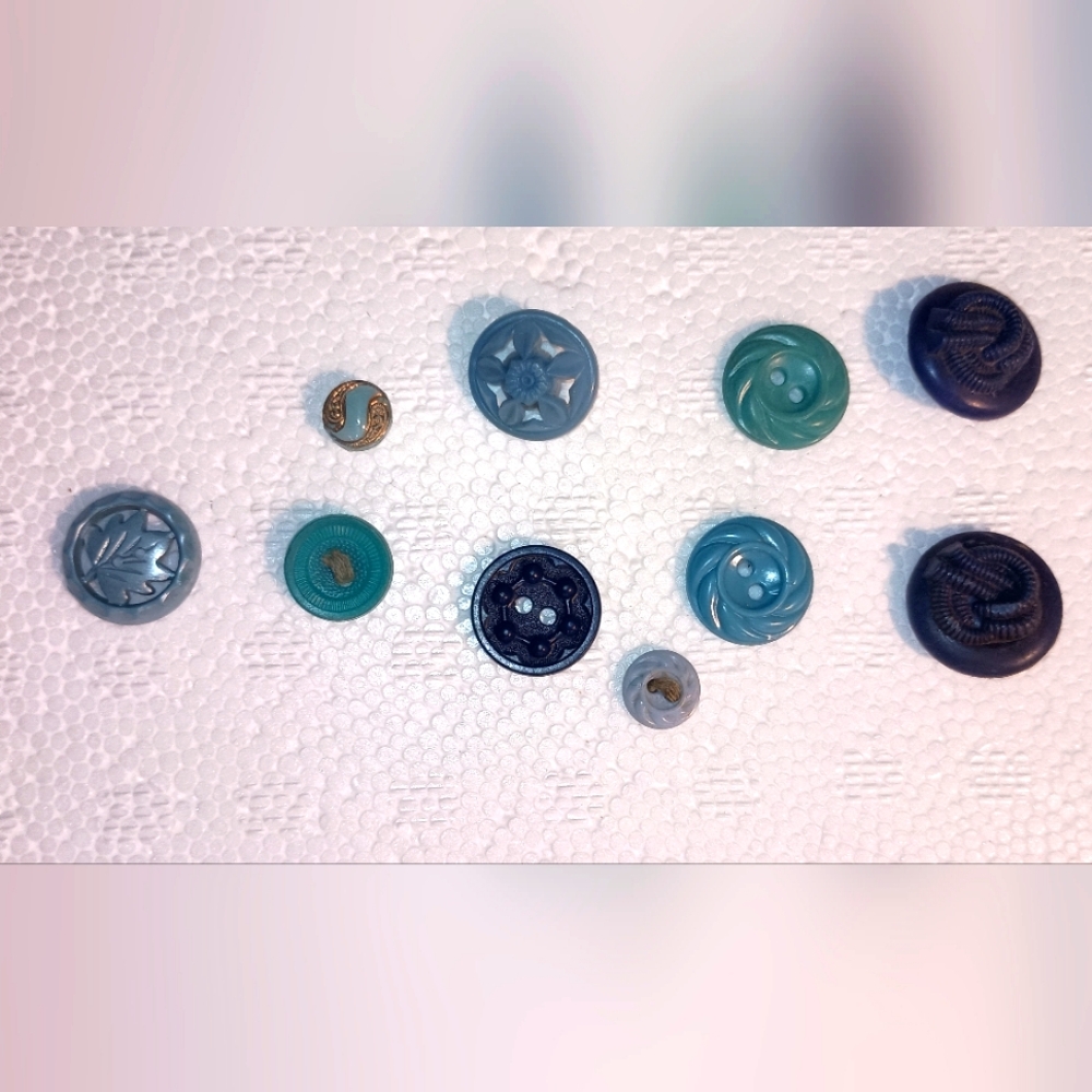 Vintage buttons.  Lot of 10.  Very unique and pretty.